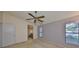 Bright bedroom with a view from the window and an ensuite vanity area at 2812 Ormandy Ct, Tampa, FL 33618