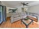 Comfortable living room with a spacious seating arrangement and an open view of the kitchen at 2812 Ormandy Ct, Tampa, FL 33618