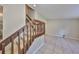 Inviting living room with tile flooring, a staircase, and neutral colors, providing a cozy and adaptable living space at 2812 Ormandy Ct, Tampa, FL 33618