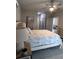 Spacious main bedroom with ample closet space and access to the ensuite bathroom at 3190 Darius Ave, North Port, FL 34288