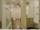 Elegant bathroom with a modern vanity, decorative lighting, and neutral color palette at 35150 Roth Ln, Dade City, FL 33525