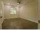 Bright bedroom featuring a large window at 35150 Roth Ln, Dade City, FL 33525