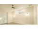 Inviting bedroom with a ceiling fan, recessed lighting, and french doors at 35150 Roth Ln, Dade City, FL 33525