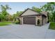 Detached garage with stone and siding at 35150 Roth Ln, Dade City, FL 33525