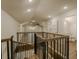 Hallway leading to an open room and bathroom, showcasing natural light and modern design at 35150 Roth Ln, Dade City, FL 33525