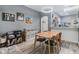 Dining area adjacent to the kitchen, featuring modern decor at 3621 Country Pointe Pl, Palm Harbor, FL 34684