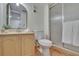 Well-lit bathroom featuring a vanity with storage and a walk-in shower at 3821 N Oak Dr # J31, Tampa, FL 33611