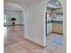 Open-concept kitchen featuring a modern sink and neutral cabinetry at 3821 N Oak Dr # J31, Tampa, FL 33611