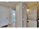 This home features a laundry closet with stacked washer and dryer for convenience at 3821 N Oak Dr # J31, Tampa, FL 33611