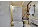Convenient laundry with a stacked washer/dryer and shelving for storage at 3821 N Oak Dr # J31, Tampa, FL 33611