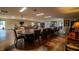 Large meeting room featuring an extended conference table and cozy seating areas at 3821 N Oak Dr # J31, Tampa, FL 33611