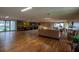 Versatile meeting space with lounge areas, a conference table, and a seamless transition to outdoor views at 3821 N Oak Dr # J31, Tampa, FL 33611