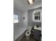 Bright bathroom with updated vanity, mirror and bath tub at 4619 Helena Ne St, St Petersburg, FL 33703