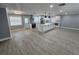 Bright open kitchen with an island, stainless steel appliances, and white cabinets at 4619 Helena Ne St, St Petersburg, FL 33703