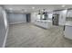 Open kitchen featuring an island, stainless steel appliances, and plenty of cabinet space at 4619 Helena Ne St, St Petersburg, FL 33703