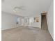 Spacious living room with neutral paint, a ceiling fan and staircase view at 4920 Pond Ridge Dr, Riverview, FL 33578
