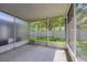 Enjoy the outdoors in this screened patio with a view of the green backyard at 4920 Pond Ridge Dr, Riverview, FL 33578
