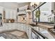 Well-appointed kitchen with granite counters, custom cabinets, and modern fixtures at 506 Crystal Grove Blvd, Lutz, FL 33548