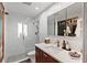 Modern bathroom features a glass-enclosed shower, sleek vanity, and contemporary fixtures at 5127 29Th S Ave, Gulfport, FL 33707