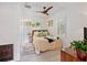 Cozy bedroom features a comfortable bed, shuttered windows, and a minimalist design at 5127 29Th S Ave, Gulfport, FL 33707