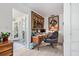 Bright home office with vintage furnishings, comfortable desk, and artistic wall decor at 5127 29Th S Ave, Gulfport, FL 33707