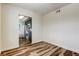 Inviting dining room showcasing wood-look floors and an open view to the kitchen at 5876 21St N St # 10, St Petersburg, FL 33714