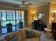 Bright sunroom with a view of the water, perfect for relaxation at 5990 Terrace Park N Dr # 109, St Petersburg, FL 33709