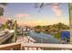 Waterfront property boasts a private dock with boat lift and canal access, perfect for boating enthusiasts at 6801 Clark St, Hudson, FL 34667
