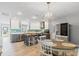 Modern kitchen features stainless steel appliances, gray cabinets, a breakfast bar, and ample counter space at 6801 Clark St, Hudson, FL 34667