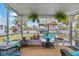 Outdoor patio with lush greenery, providing a serene space for relaxation and enjoyment at 6801 Clark St, Hudson, FL 34667