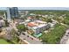 An aerial view of the building in the neighborhood showcasing the pool at 701 Mirror Lake N Dr # 119, St Petersburg, FL 33701
