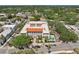 Aerial view of the property showcasing the pool, landscaping, and nearby street at 701 Mirror Lake N Dr # 119, St Petersburg, FL 33701