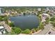 Scenic aerial view of lake with buildings and city in the background at 701 Mirror Lake N Dr # 119, St Petersburg, FL 33701