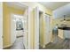 Hallway with bathroom and bedroom access, and closet at 701 Mirror Lake N Dr # 119, St Petersburg, FL 33701