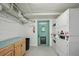 Clean laundry room with multiple machines and ample space at 701 Mirror Lake N Dr # 119, St Petersburg, FL 33701