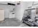 A spacious garage with laundry hookups and room for your car and golf cart at 7441 Trovita Rd, Land O Lakes, FL 34637