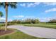 Beautiful golf course view with a sand trap and lush green grass at 7441 Trovita Rd, Land O Lakes, FL 34637
