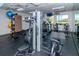Well-equipped gym with modern weight machines and exercise equipment for a complete workout at 7441 Trovita Rd, Land O Lakes, FL 34637