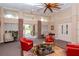 Bright lobby with inviting seating and natural light pouring through the large windows at 7441 Trovita Rd, Land O Lakes, FL 34637