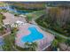 The community includes a clubhouse, swimming pool, golf course, and driving range at 7441 Trovita Rd, Land O Lakes, FL 34637