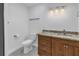 Modern bathroom with new fixtures, granite countertops, and tile floors at 783 41St Ne Ave, St Petersburg, FL 33703