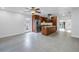 Open-concept kitchen featuring an island, stainless steel appliances, and abundant natural light at 783 41St Ne Ave, St Petersburg, FL 33703