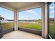 Screened patio with view of the lake at 810 Fern Leaf Dr, Ruskin, FL 33570