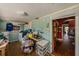 Room with a washer, dryer, sewing table and other equipment at 910 E North Bay St, Tampa, FL 33603