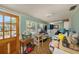 Room with a washer, dryer, sewing table, and exterior access at 910 E North Bay St, Tampa, FL 33603
