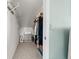 Well-organized walk-in closet with ample storage space and shelving units to maximize storage capacity at 911 Harbour House Dr, Indian Rocks Beach, FL 33785