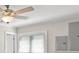 Cozy bedroom with lots of natural light, neutral paint, and a ceiling fan at 931 Inlet Cir, Venice, FL 34285