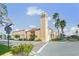 Front view of the large professional building complex with lush landscaping at 931 Inlet Cir, Venice, FL 34285