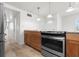 Modern kitchen with granite countertops and stainless steel appliances at 109 Carmelina St, Ruskin, FL 33570