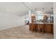 Bright eat-in kitchen with wooden cabinetry, granite countertops, and stainless appliances at 109 Carmelina St, Ruskin, FL 33570